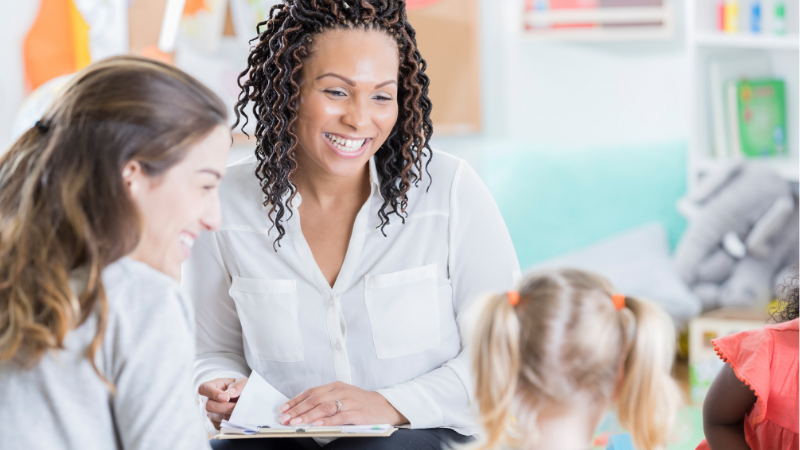 parent having meeting with teacher
