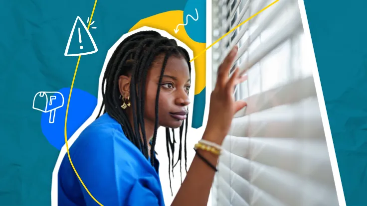 Young woman looking out window