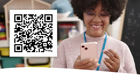 A teacher looks at her cell phone and subscribes to the Common Sense Education Instagram account